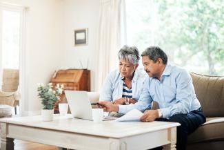 couple looking at laptop